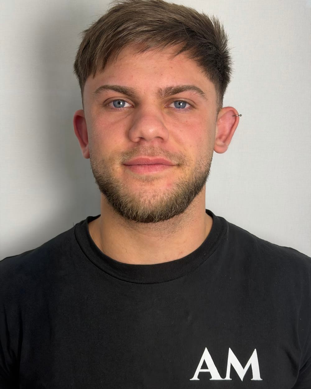 Agustín Mongiello, barbero de AM Barbería en Villa Urquiza